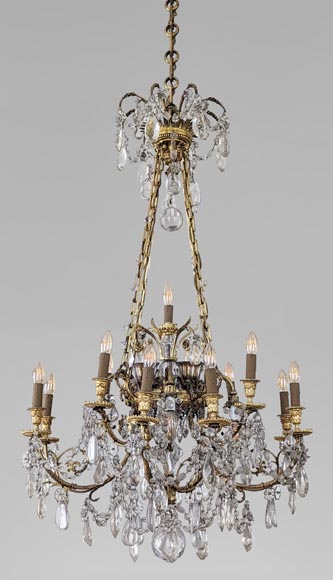 Louis XVI style chandelier in gilt bronze and crystals decorated with rams heads-0
