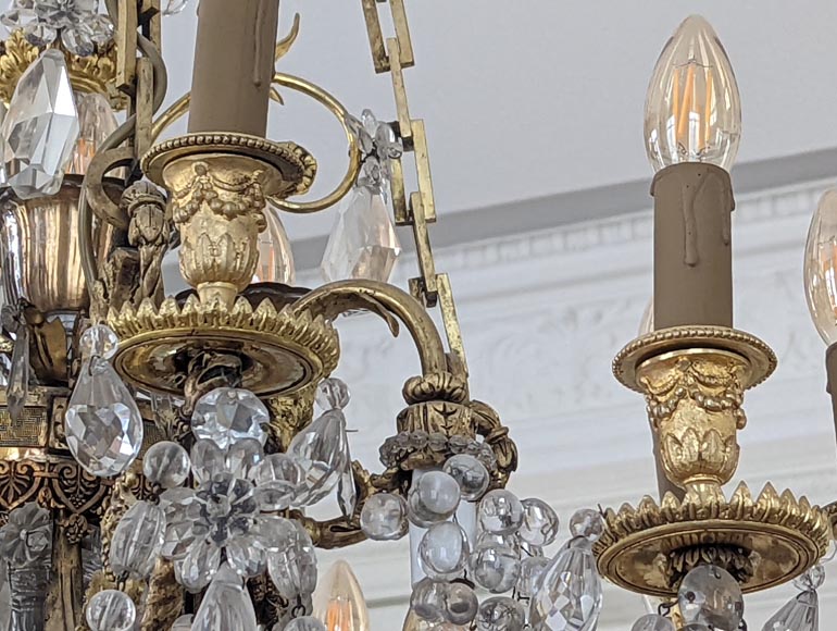 Louis XVI style chandelier in gilt bronze and crystals decorated with rams heads-6