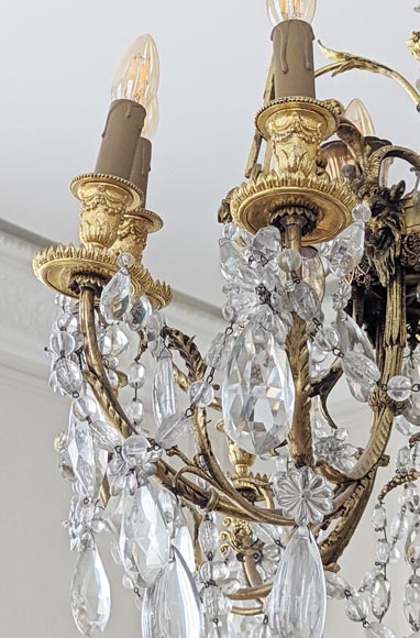 Louis XVI style chandelier in gilt bronze and crystals decorated with rams heads-8