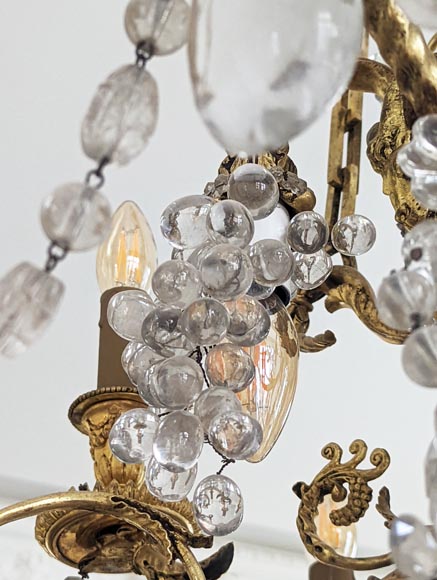 Louis XVI style chandelier in gilt bronze and crystals decorated with rams heads-10