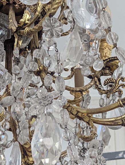 Louis XVI style chandelier in gilt bronze and crystals decorated with rams heads-12