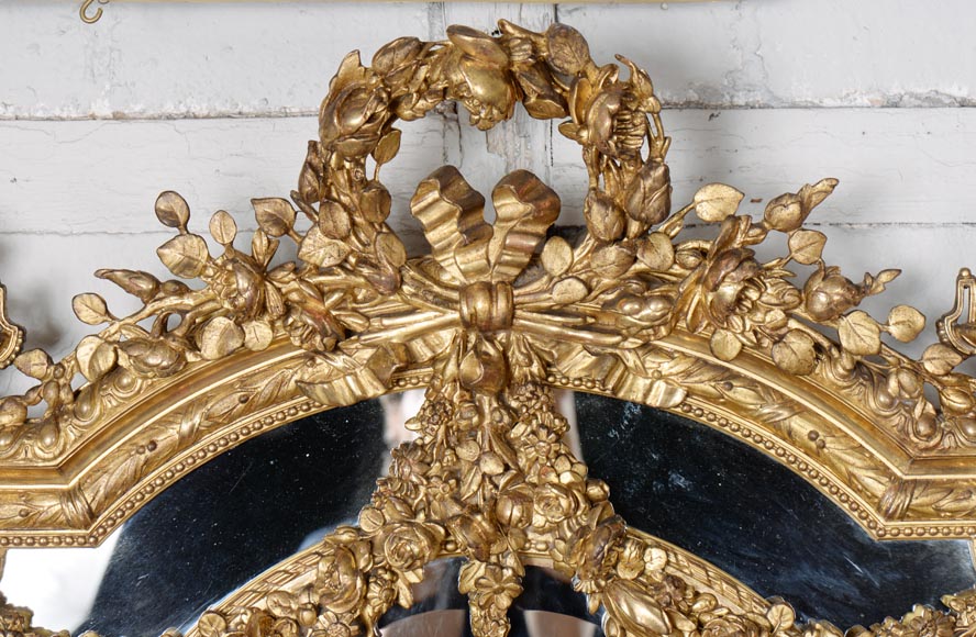 Louis XVI style gilt mirror with flower garlands and bevelled glass-1