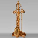 Louis XV style ormolu mantelpiece tool set