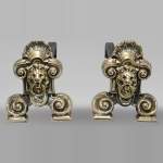 Pair of andirons with lion heads