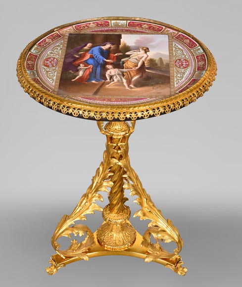 Gilt bronze guéridon with painted porcelain plaque, after Adrian VAN DER WERFF, “The Dismissal of Hagar” Gilt bronze guéridon with painted porcelain plaque, after Adrian VAN DER WERFF, “The Dismissal of Hagar”-0