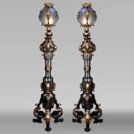 Maison Bernard, wrought iron craftsman, pair of richly decorated floor lamps, circa 1900-1905