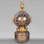 L’Escalier de CRISTAL – Japonist Glass Clock in the Shape of a Sphere Emerging from a Lotus Flower