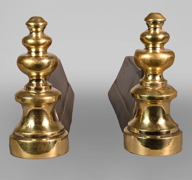 Pair of cast iron and polished bronze andirons-0