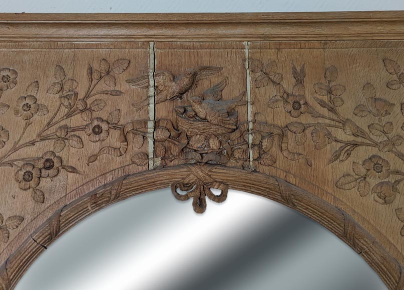Louis XVI style trumeau in carved oak adorned with a bird's nest framed by floral decoration-1