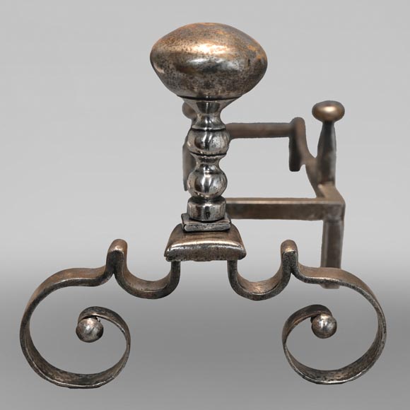 Pair of scrolled andirons topped with a ball-1