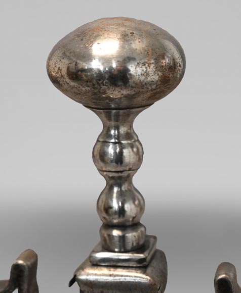 Pair of scrolled andirons topped with a ball-3