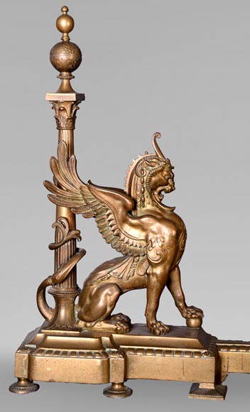 Pair of Egyptian-style gilt-bronze firedogs with confronting griffins Pair of Egyptian-style gilt-bronze firedogs with confronting griffins-3