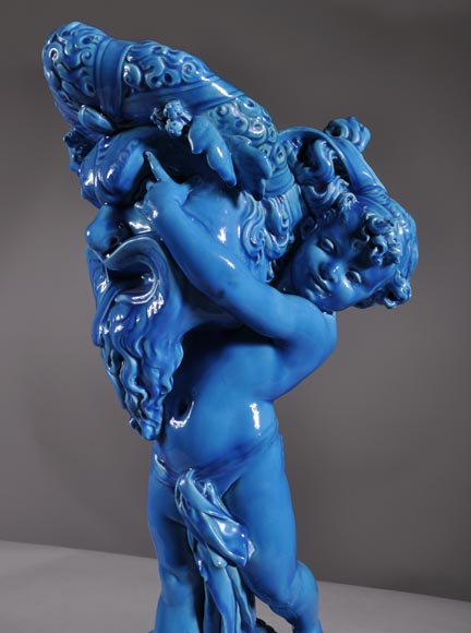 Joseph Chéret (1838 - 1894) for the Manufactory of Sèvres "Putto with greek masks" Coin tray made in faience with a blue glaze-3