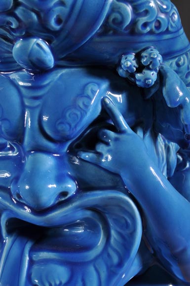 Joseph Chéret (1838 - 1894) for the Manufactory of Sèvres "Putto with greek masks" Coin tray made in faience with a blue glaze-4