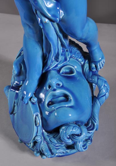 Joseph Chéret (1838 - 1894) for the Manufactory of Sèvres "Putto with greek masks" Coin tray made in faience with a blue glaze-6