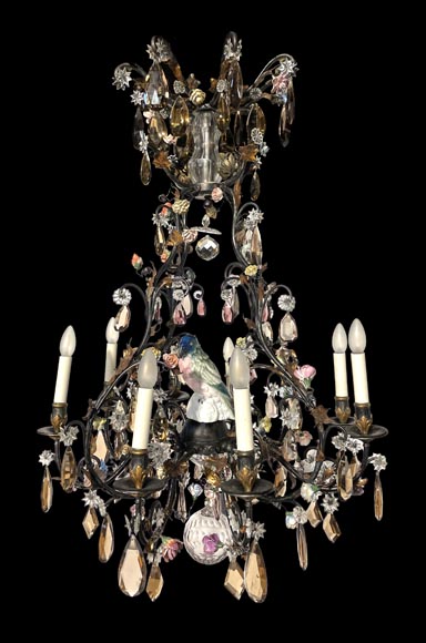 Patinated brass chandelier decorated with flowers and a polychrome porcelain parakeet Patinated brass chandelier decorated with flowers and a polychrome porcelain parakeet-0