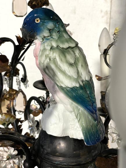 Patinated brass chandelier decorated with flowers and a polychrome porcelain parakeet Patinated brass chandelier decorated with flowers and a polychrome porcelain parakeet-2