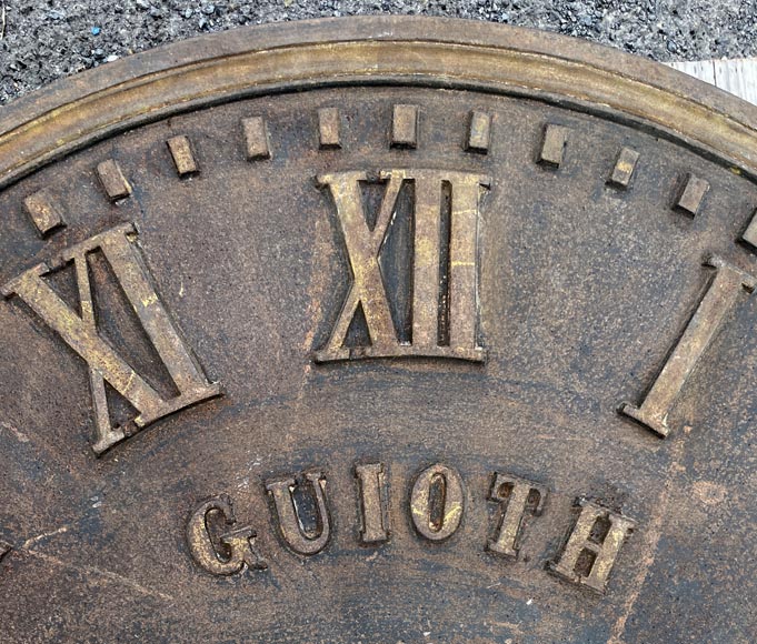 Large cast iron public clock face, with raised Roman numerals, signed Large cast iron public clock face, with raised Roman numerals, signed
