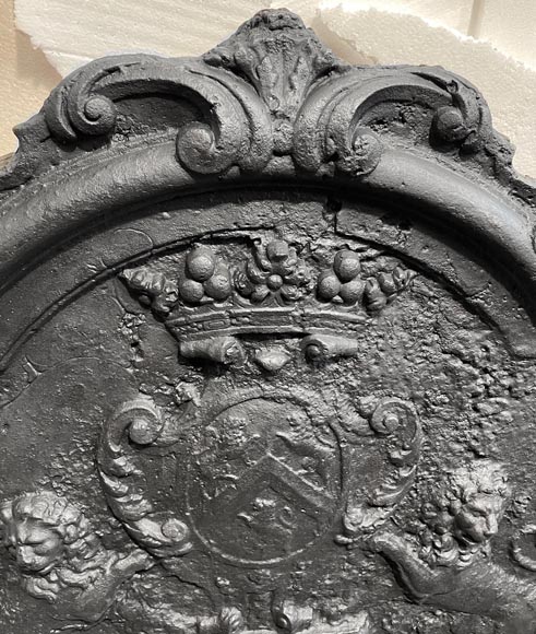 Fireback bearing a coat of arms and decorated with lions-3