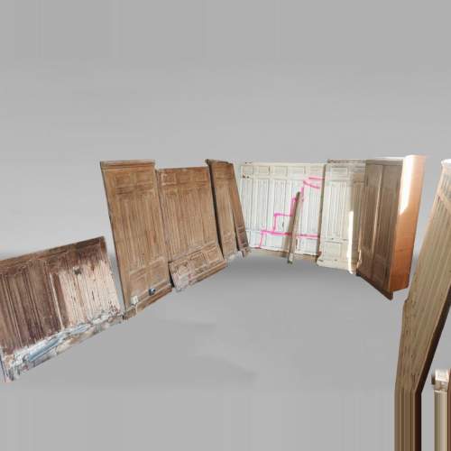 Neo-Gothic style oak wainscoting featuring a 