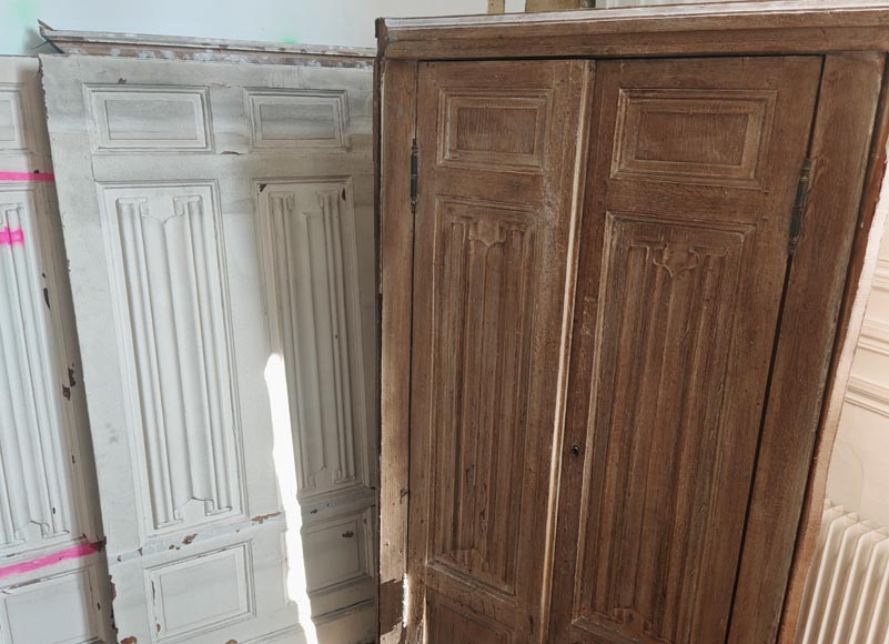 Neo-Gothic style oak wainscoting featuring a Neo-Gothic style oak wainscoting featuring a