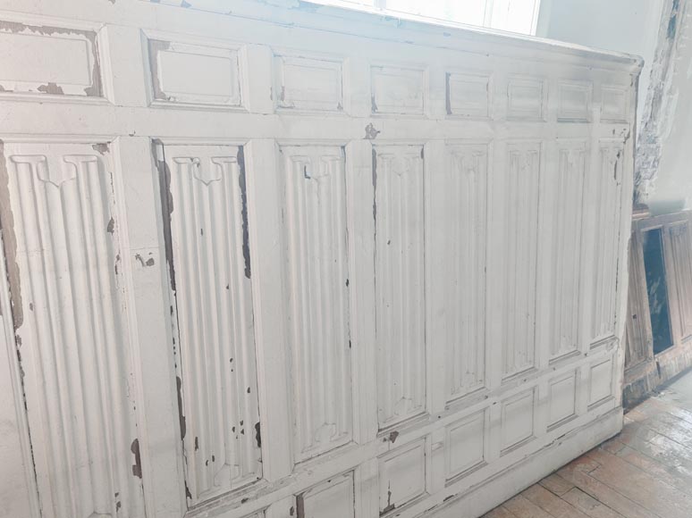 Neo-Gothic style oak wainscoting featuring a Neo-Gothic style oak wainscoting featuring a