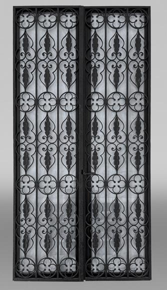 Napoleon III period openwork wrought-iron double door with its frame. Napoleon III period openwork wrought-iron double door with its frame.-0