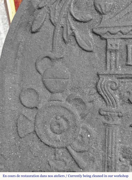  Cast iron fireback in a semicircle, dated 1623-5