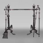 Pair of wrought iron fire dogs with dragon heads — Signed E. LARCHEVÊQUE, Mehun (Cher), France — Late 19th century