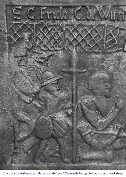 Cast iron fireplace plaque depicting 