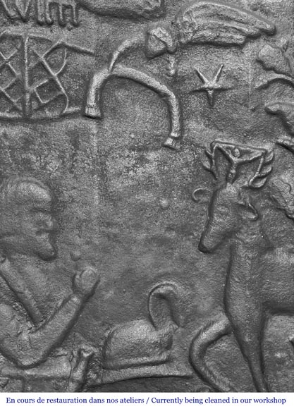 Cast iron fireplace plaque depicting 