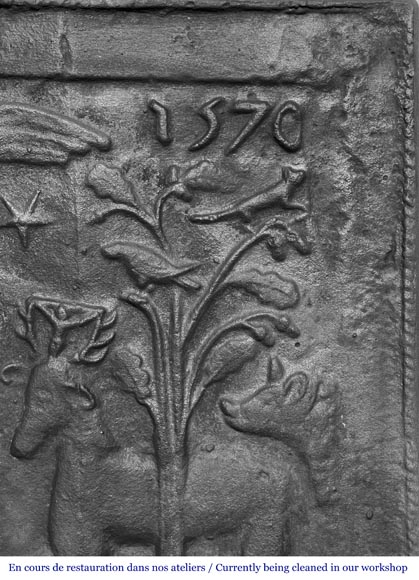 Cast iron fireplace plaque depicting 