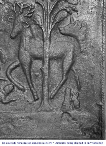 Cast iron fireplace plaque depicting 