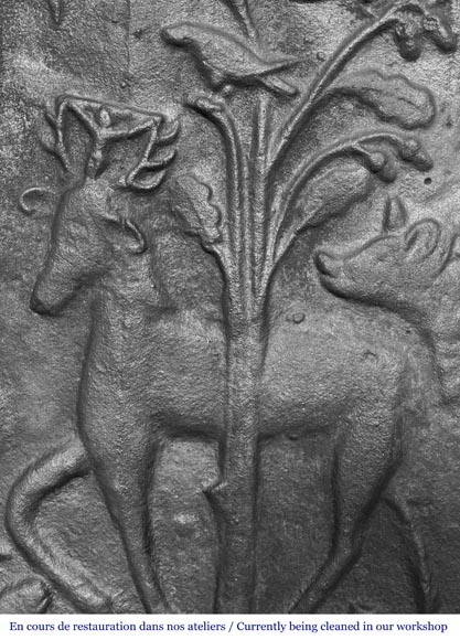 Cast iron fireplace plaque depicting 