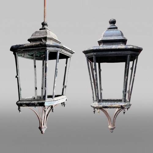 Important pair of hexagonal architectural lanterns in patinated metal
