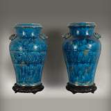 Longwy faience: pair of vases on a wood base