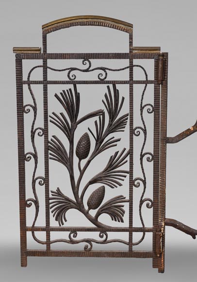 Wrought-iron fireplace spark guard with pine branch decoration, 1930s-2