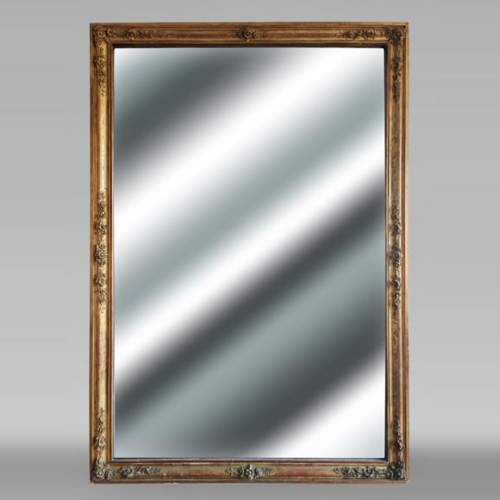 Gilded Louis Philippe period trumeau with floral decoration and engravings