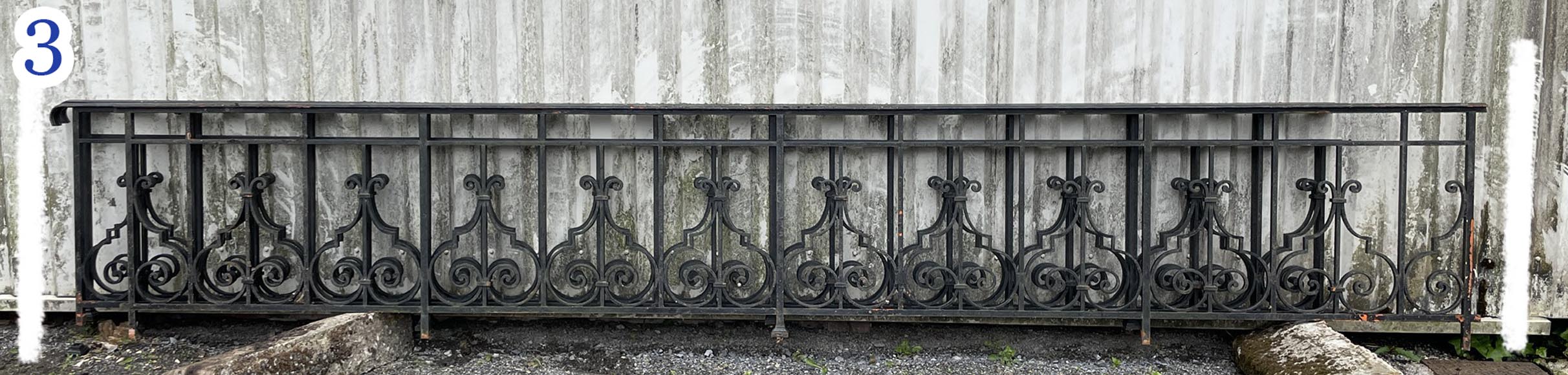 Set of wrought-iron railings featuring a design of scrolls and volute terminals, including both straight and raked sections Set of wrought-iron railings featuring a design of scrolls and volute terminals, including both straight and raked sections-3