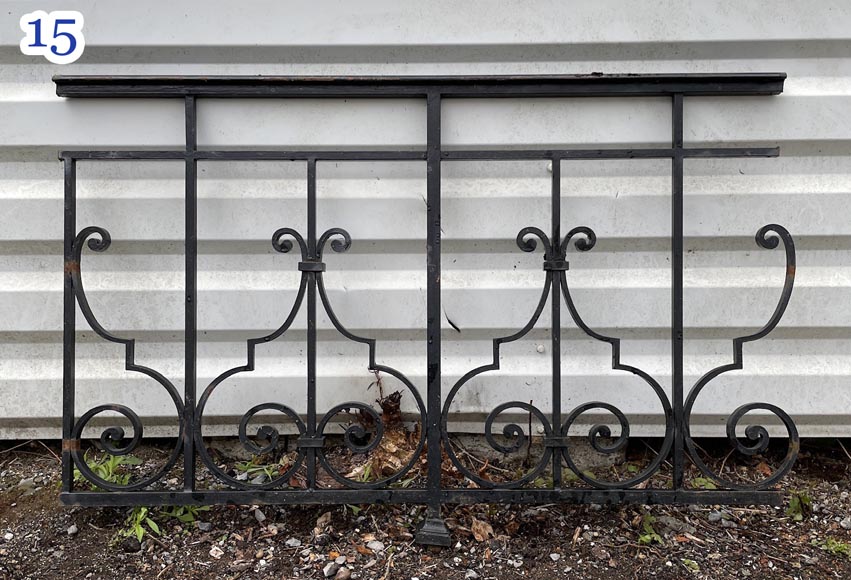 Set of wrought-iron railings featuring a design of scrolls and volute terminals, including both straight and raked sections Set of wrought-iron railings featuring a design of scrolls and volute terminals, including both straight and raked sections-15