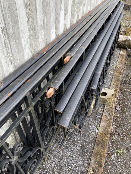 Set of wrought-iron railings featuring a design of scrolls and volute terminals, including both straight and raked sections Set of wrought-iron railings featuring a design of scrolls and volute terminals, including both straight and raked sections-19