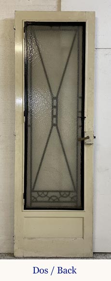 Art Deco interior door in wood and wrought metal, featuring geometric ornamentation and textured glass-1