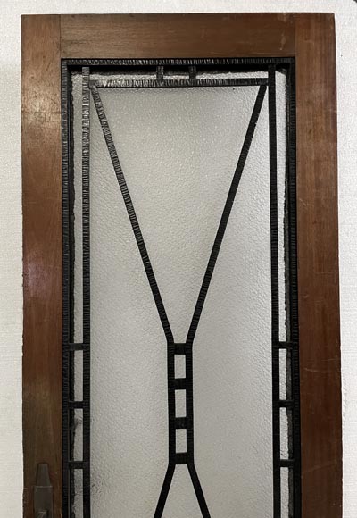 Art Deco interior door in wood and wrought metal, featuring geometric ornamentation and textured glass-3