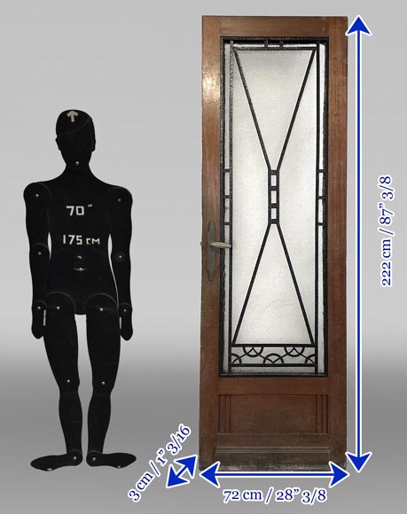 Art Deco interior door in wood and wrought metal, featuring geometric ornamentation and textured glass-9