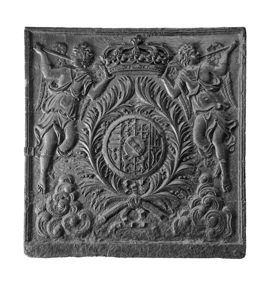 18th-century fireback featuring a coat of arms framed by musical angels-0