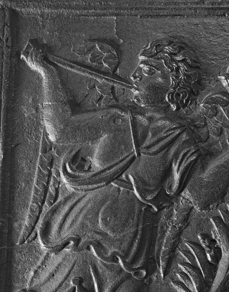 18th-century fireback featuring a coat of arms framed by musical angels-3