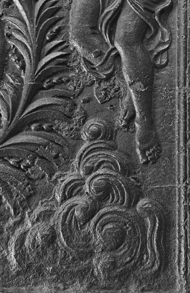 18th-century fireback featuring a coat of arms framed by musical angels-8
