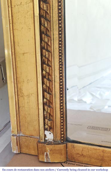 Gilt Louis XVI-style trumeau mirror with a floral wreath-3