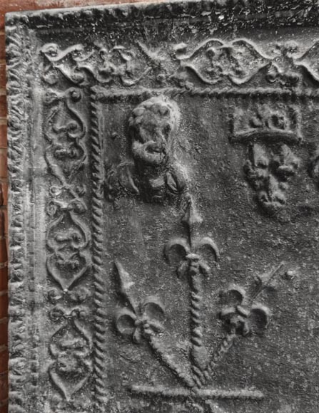 Cast-iron fireback decorated with a coat of arms and a portrait bust Cast-iron fireback decorated with a coat of arms and a portrait bust-1