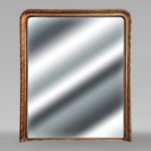 Louis XVI-style gilded overmantel mirror featuring a frieze decoration